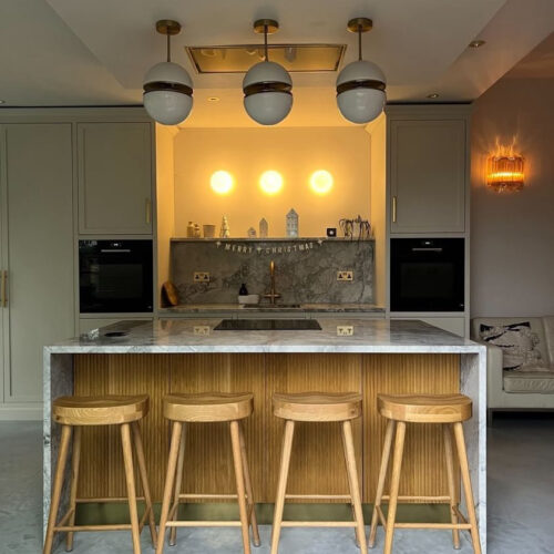 Bistro pendant lights above a kitchen island