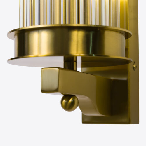 wall light with small clear glass rods and brass finish