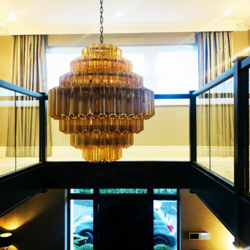 amber-palermo-yellow-chandelier-hallway