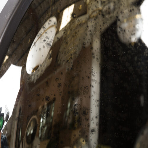 aged glass convex mirror