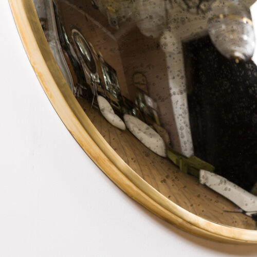 aged glass convex mirror with brass frame