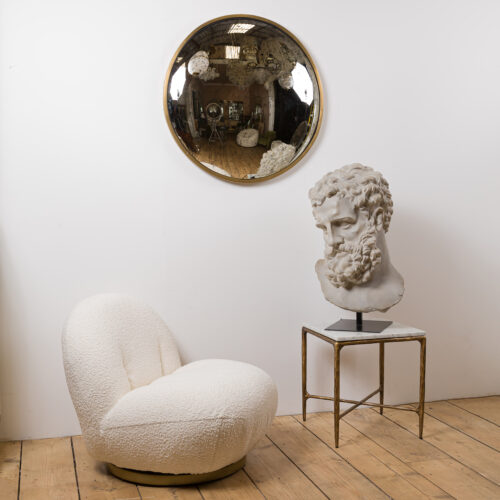 aged glass convex mirror with brass frame