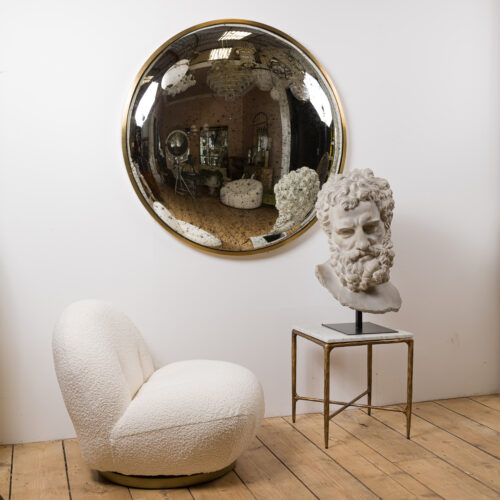 aged glass convex mirror with brass frame