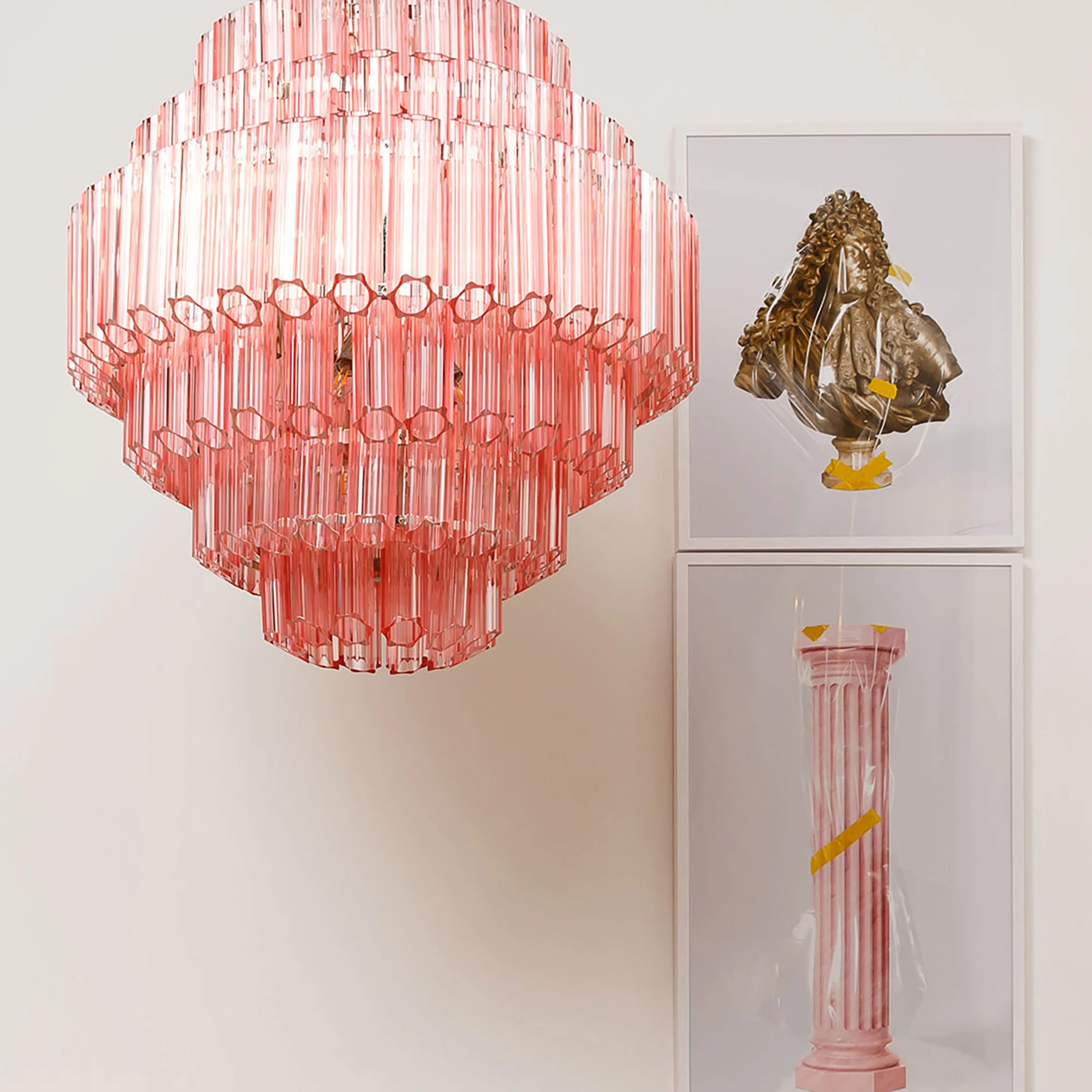 Pure White Lines best sellers includes the large pink chandelier - the Grande Palermo