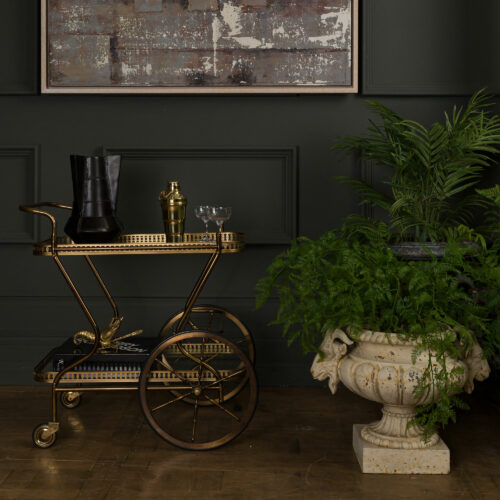 brass drinks trolley with brass langoustine ornament