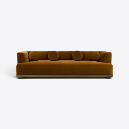 Juliet mid-century sofa in mustard velvet with oak plinth base