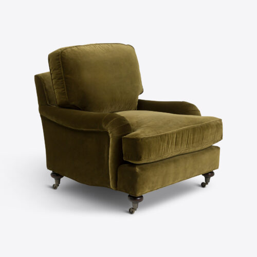 moss green velvet traditional armchair on castors