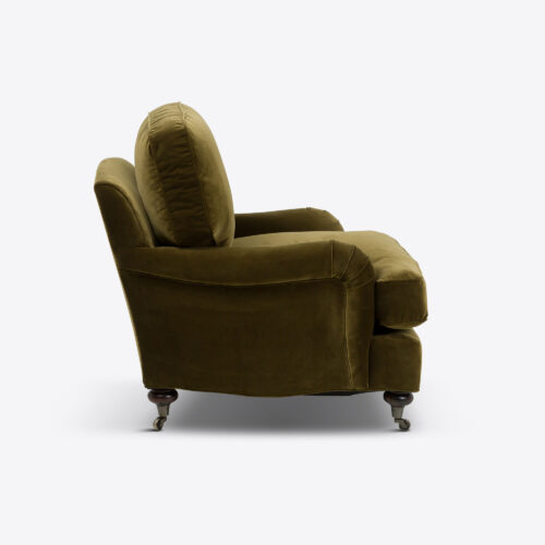 moss green velvet traditional armchair on castors