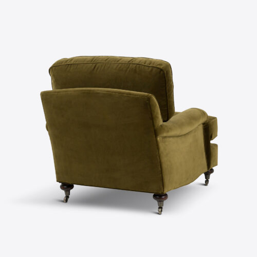 moss green velvet traditional armchair on castors