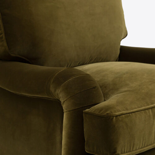 moss green velvet traditional armchair on castors