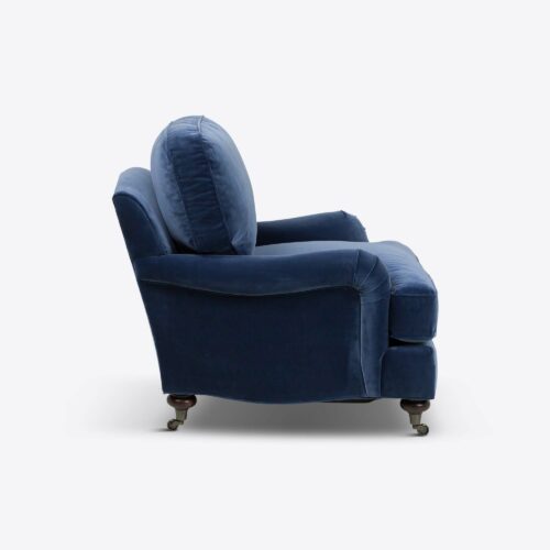 cornflower blue velvet traditional armchair on castors