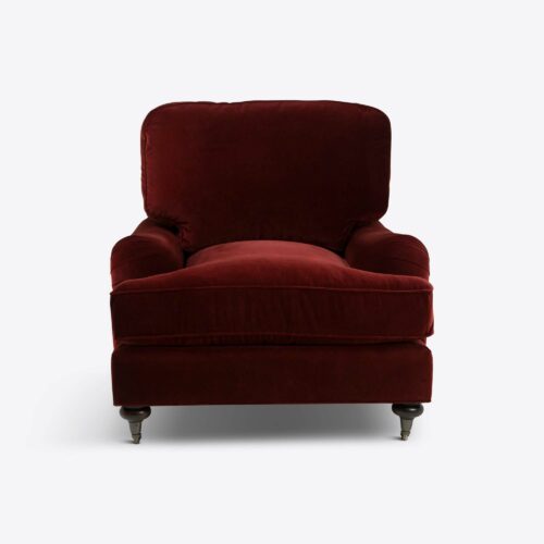 red velvet traditional armchair on castors