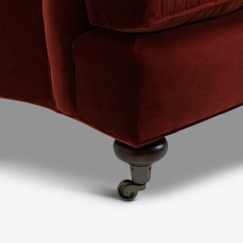 red velvet traditional armchair on castors