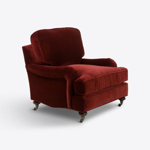 red velvet traditional armchair on castors