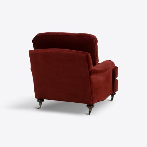 red velvet traditional armchair on castors