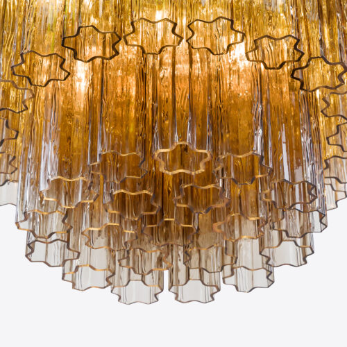 Treviso mid-century inspired tiered glass chandelier in clear smoked quartz or pink glass