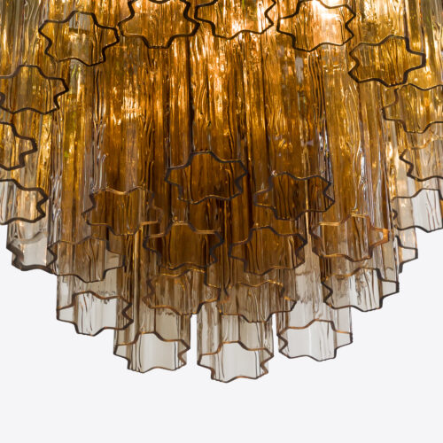 Treviso mid-century inspired tiered glass chandelier in clear smoked quartz or pink glass