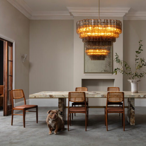 mid-century inspired dining chandelier in smoked quartz pink or clear glass with a Patagonia quartzite dining table