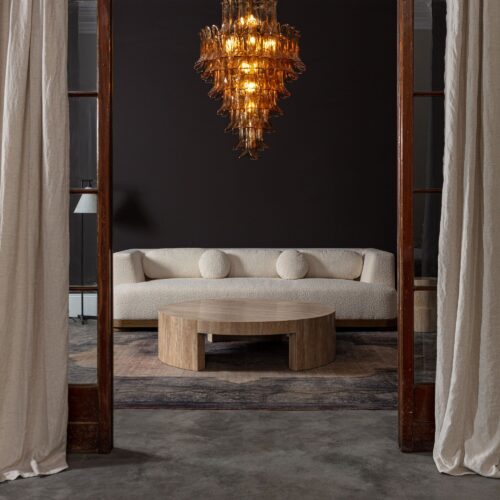 boucle-Juliet-sofa-mid-century-inspired_velvet-sofa-on-wood-plinth.jpg